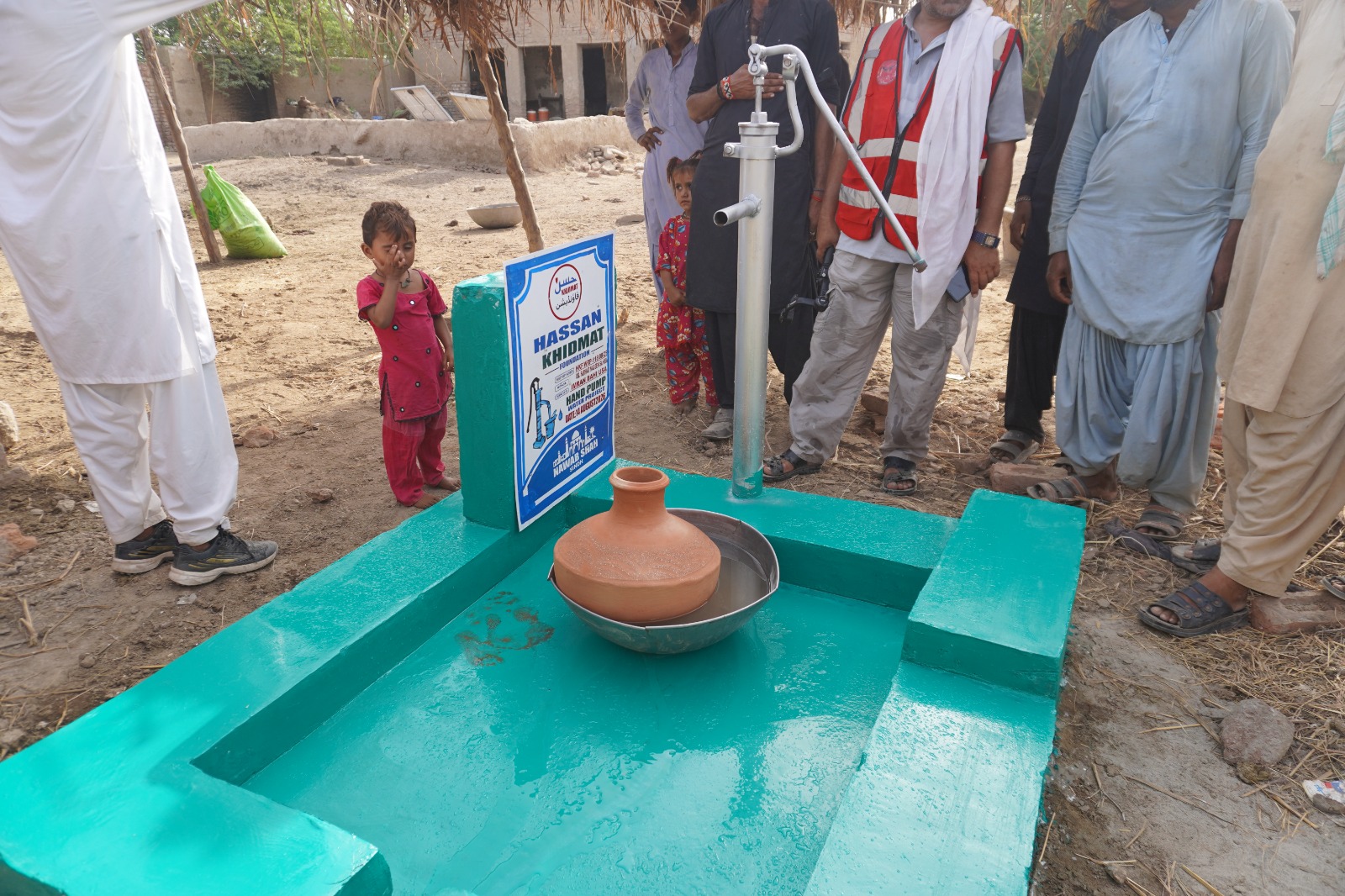 Fresh water flowing from a community hand pump